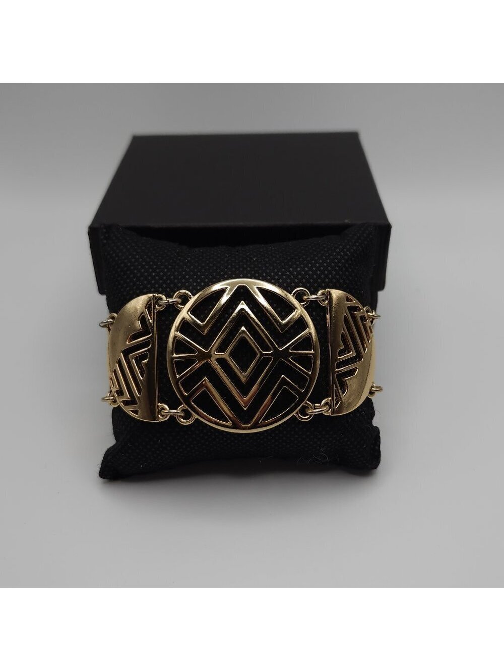 Golden Bracelet With Woven Detail